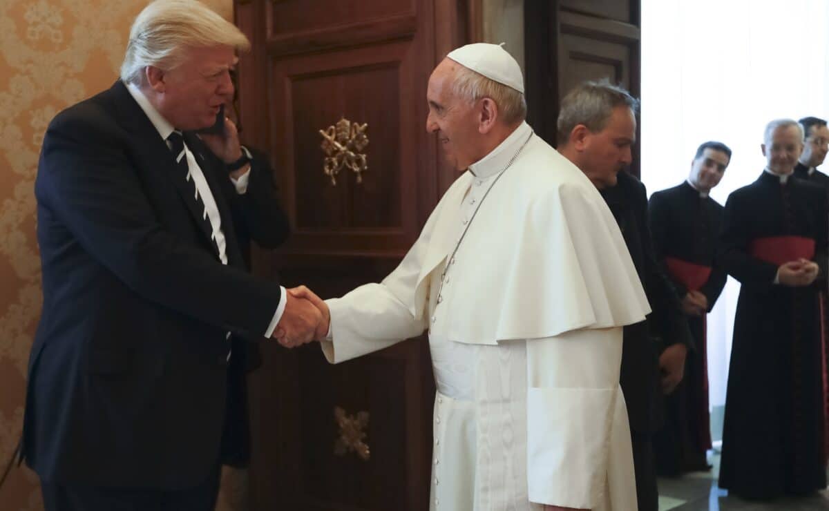 The late Pope Francis shaking hands with US President Donald Trump.