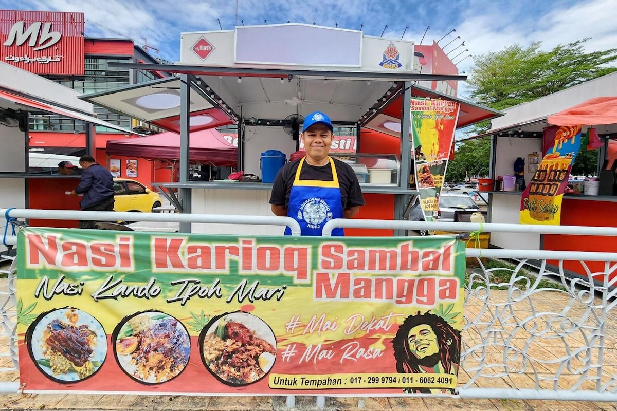 Malaysia moves to clean up its street food scene with shiny new kiosks topped with solar panels