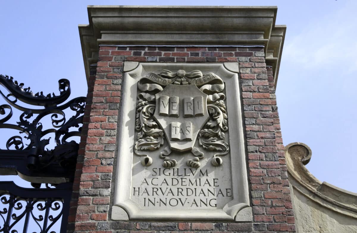 A relief sculpture rests on a gate to the entrance of Harvard University, in Cambridge, Mass., March 13, 2016.  (AP Photo/Steven Senne, File)