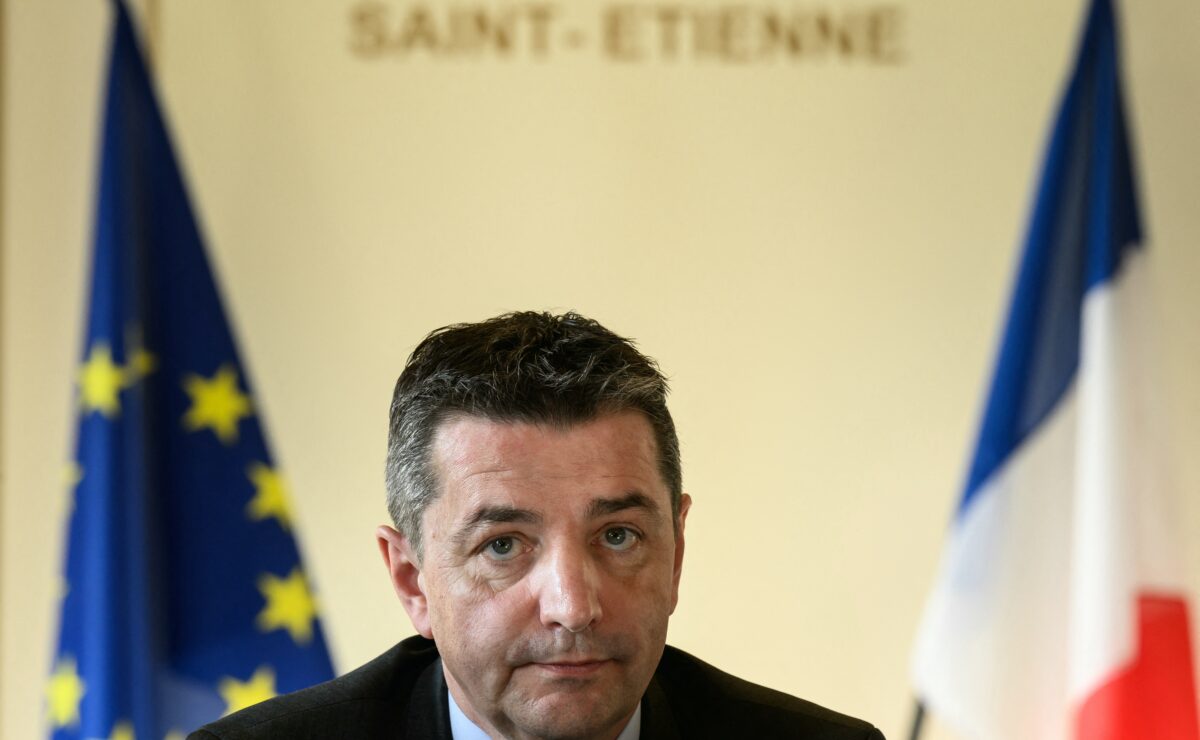(FILES) French mayor of Saint-Etienne, Gael Perdriau listens to a speech during a press conference, on January 29, 2024 in Saint-Etienne city hall. The court has ordered a trial against the mayor of Saint-Etienne, Gaël Perdriau (ex-LR), in the case of blackmail with an intimate video targeting an aide, which is expected to take place at the end of September in Lyon, the Lyon prosecutor told AFP on June 6, 2025. (Photo by JEFF PACHOUD / AFP)